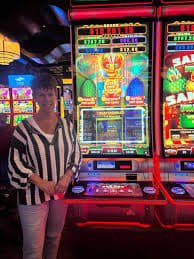 winslot77 platform interface showing sportsbook, live-dealer, and slots navigation
